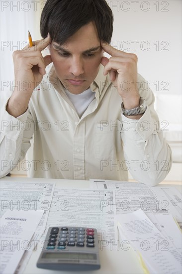 Man preparing taxes.