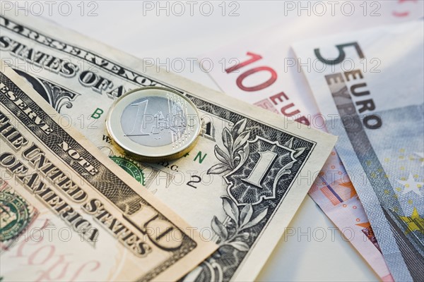 Close up of us dollars and euros.