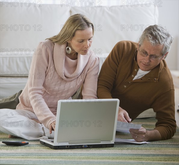 Couple paying bills.