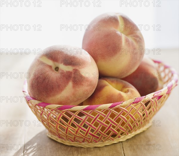 Close up of peaches in basket. Date : 2008