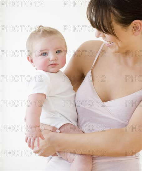 Mother smiling at baby. Date : 2008