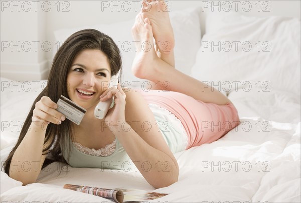 Woman shopping on telephone. Date : 2008