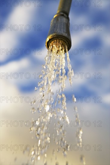 shower head and streaming water. Date : 2008