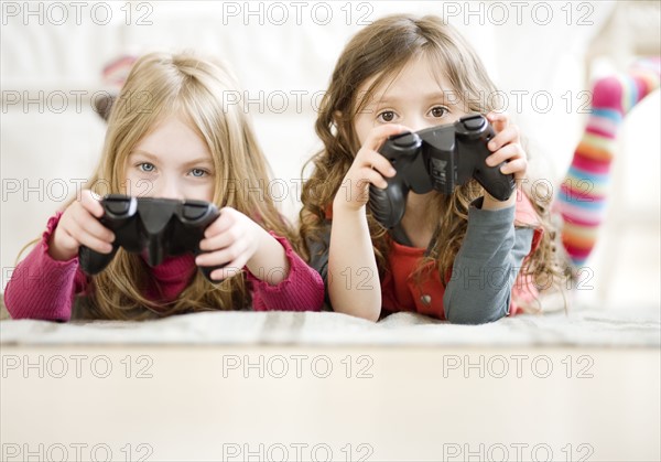 Sisters playing videogame. Date : 2008
