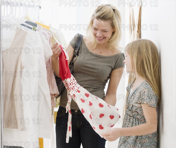 Mother and daughter clothing shopping. Date : 2008