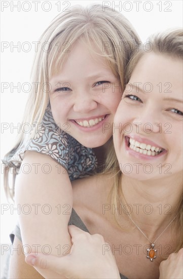 Mother and daughter hugging. Date : 2008