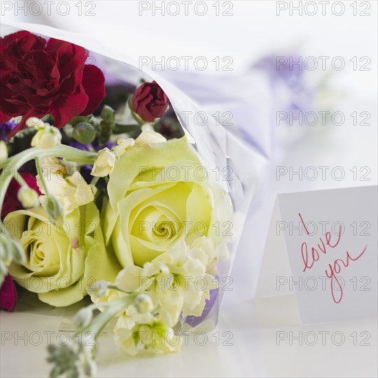 Close up of flower bouquet and note. Date : 2008