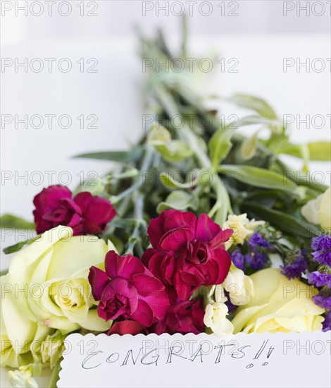 Close up of flower bouquet and note. Date : 2008