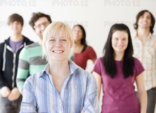 Woman with friends in background. Date : 2008