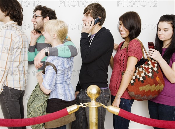 Group of people waiting in line. Date : 2008