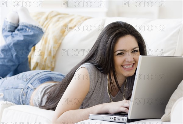 Woman typing on laptop. Date : 2008