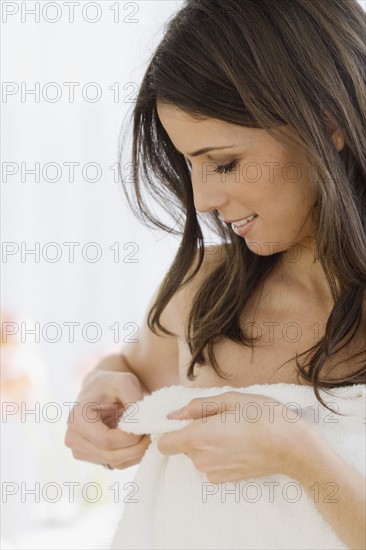 Woman adjusting towel. Date : 2008