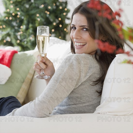 Woman drinking champagne. Date : 2008