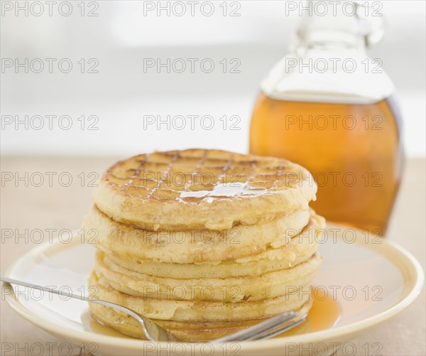 Close up of waffles and syrup. Date : 2008