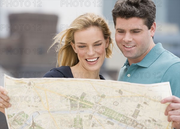 Couple looking at map.