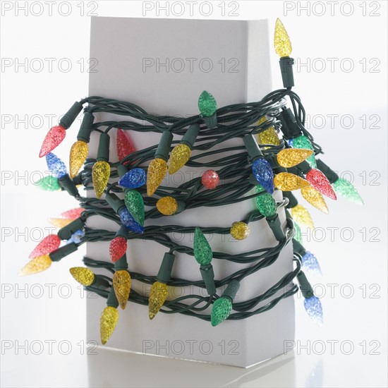 Christmas lights wrapped around box. Date : 2008