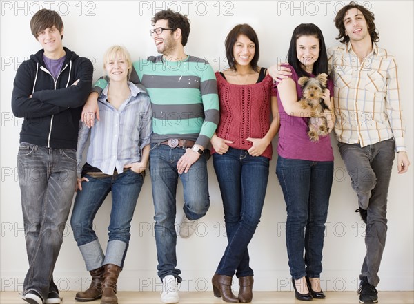 Group of friends leaning on wall. Date : 2008