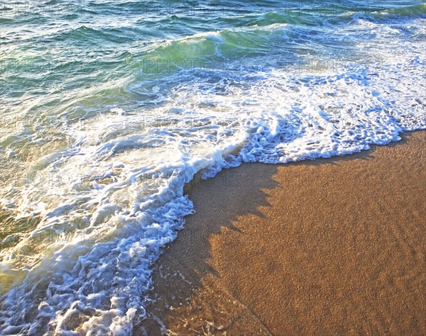 High angle view of ocean waves on shore. Date : 2008