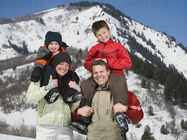 Family in front of snowy mountain. Date : 2008