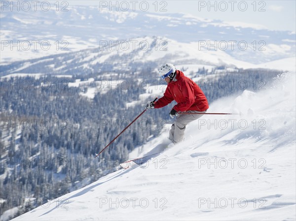 Man skiing downhill. Date : 2008