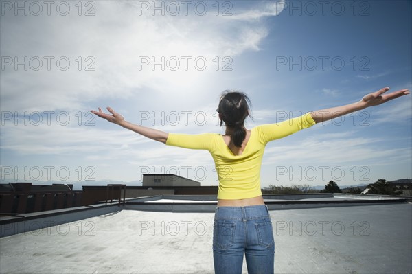 Woman with arm outstretched. Date : 2008