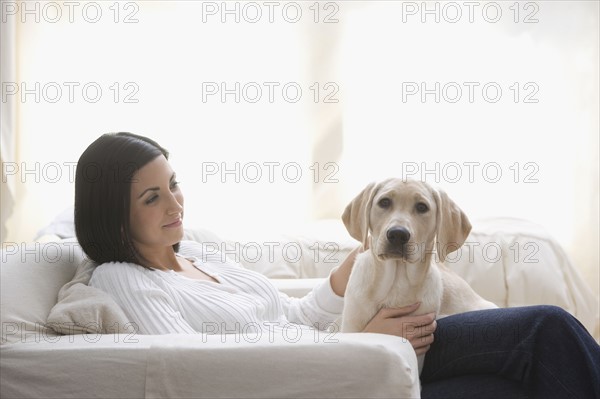 Dog on woman’s lap. Date : 2008