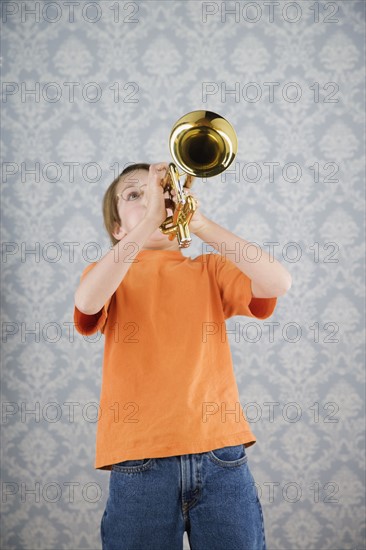 Boy playing trumpet. Date : 2008