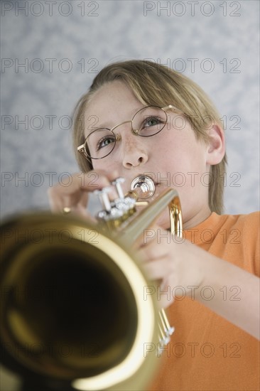 Boy playing trumpet. Date : 2008