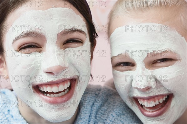 Girls with facial treatment laughing. Date : 2008