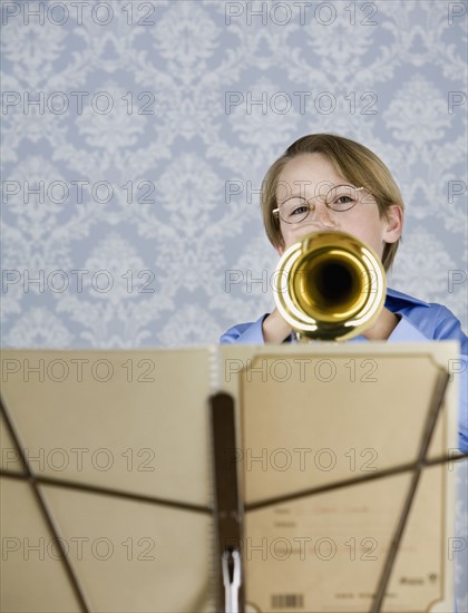 Boy playing trumpet. Date : 2008