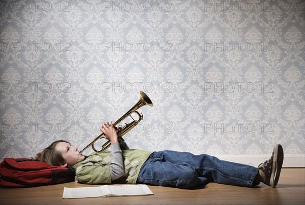 Boy playing trumpet. Date : 2008