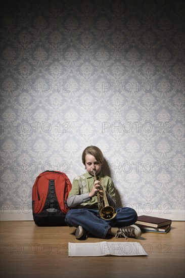 Boy playing trumpet. Date : 2008