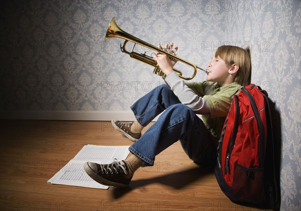 Boy playing trumpet. Date : 2008