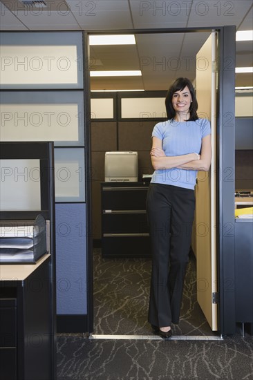 Businesswoman with arms crossed. Date : 2008