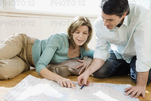 Couple looking at blueprints. Date : 2008