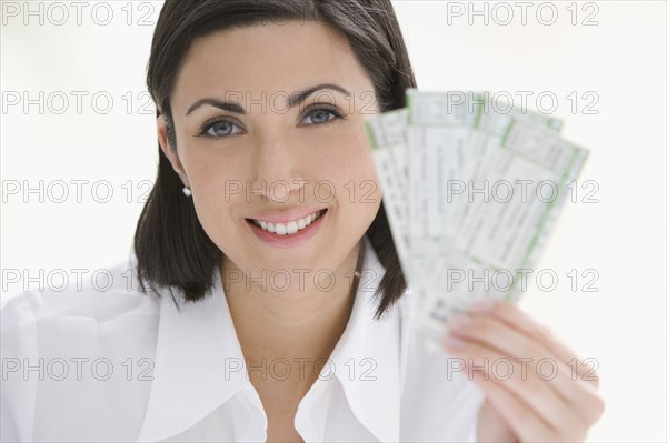 Woman holding tickets. Date : 2008