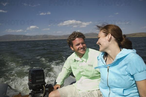 Couple on motorboat, Utah, United States. Date : 2008