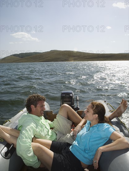 Couple on motorboat, Utah, United States. Date : 2008