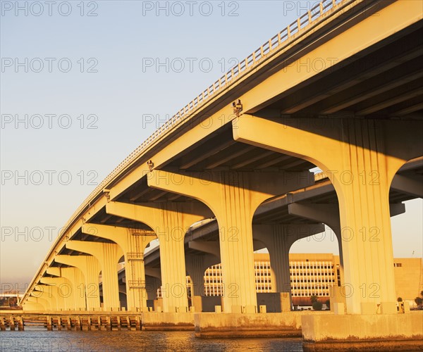 Low angle view of elevated highway over water. Date : 2008