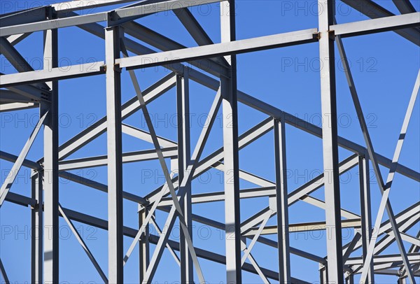 Beams at construction site under blue sky. Date : 2008