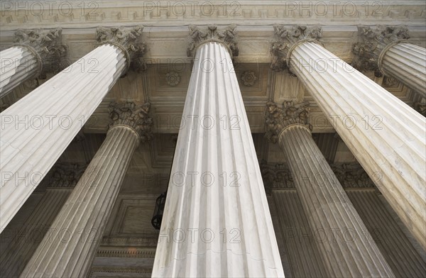 Low angle view of stone columns. Date : 2008