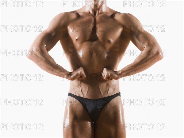 Male body builder flexing and posing. Date : 2008