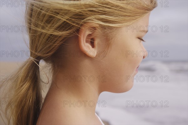 Profile of girl at beach. Date : 2008