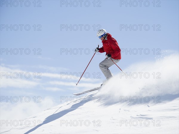 Man skiing downhill. Date : 2008