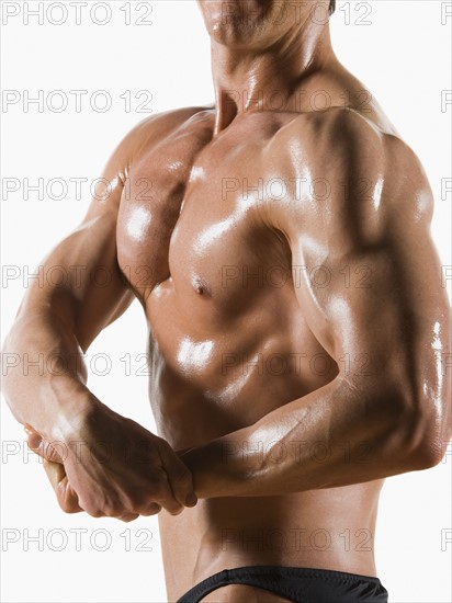 Male body builder flexing and posing. Date : 2008