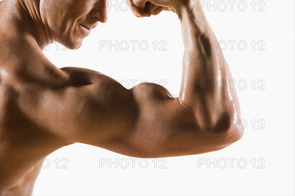 Male body builder flexing and posing. Date : 2008