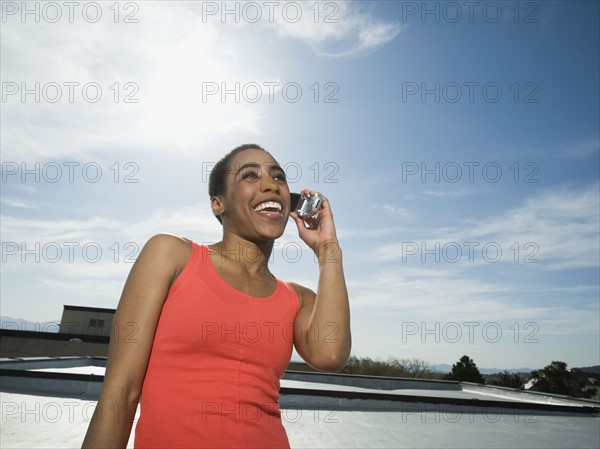 African woman talking on cell phone. Date : 2008