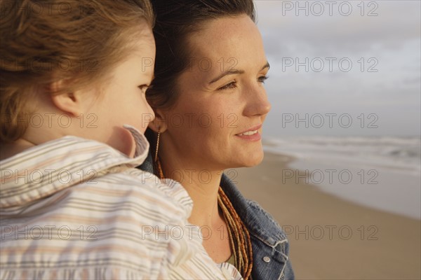 Mother and daughter at beach. Date : 2008