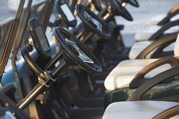 Close up of row of golf carts. Date : 2008