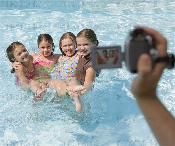 Girls being videotaped in swimming pool. Date : 2008